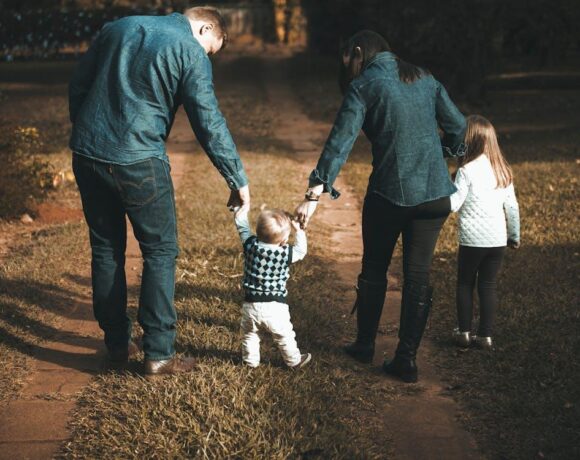 Free Family Walking on Path Stock Photo